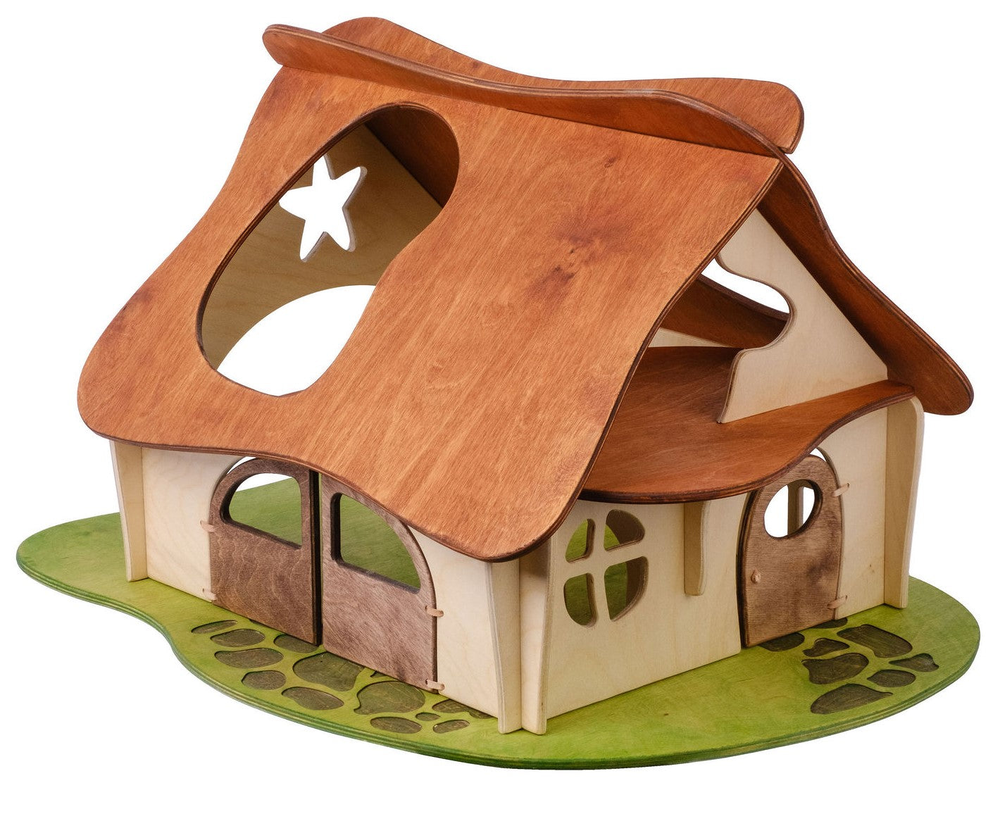 A medium-sized wooden dollhouse with a thatched roof and multiple windows, set on a green base that represents grass.