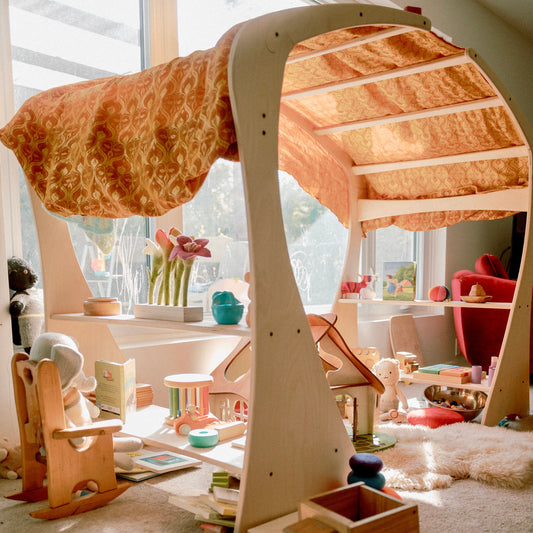 Handcrafted wooden Montessori playstand by Twig Studio